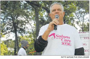 Andrew Abramson addresses the crowd during Sunday’s event, which raised funds for the Cure Breast Cancer Foundation — the Clifton-based charity that his family founded. 