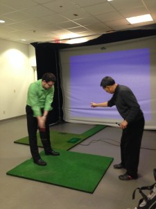 Master Seung Wook Kim of Golf 21 works with Trio resident at recent golf clinic