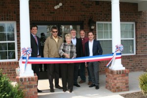PHOTO: (From Left to Right) Andy Nowack, Vice President of Premier Development, Stan Schrek, Raritan Borough Engineer, Raritan Mayor Jo-Ann Liptak, Anatol Hiller, Principal of Premier Development, Raritan Borough Councilman Greg Lobell and Jeff Hiller, Principal of Premier Development join for ribbon cutting ceremonies to mark the opening of new affordable apartment homes at Stone Bridge at Raritan. Up to 50% of the homes will be reserved for Military veterans.