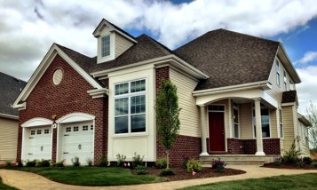 THE BELMONT MODEL AT PREMIER DEVELOPMENT'S GATEWAY AT ROYCE BROOK.