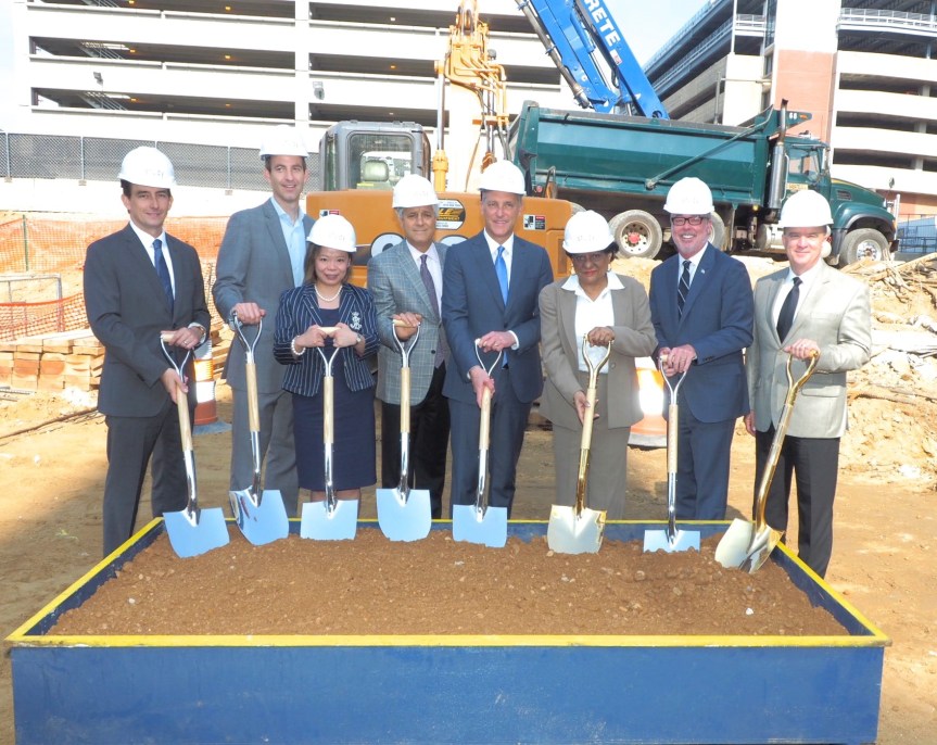 Officials break ground on The Study at University City. From left to right: James Richards, HSBC; Jeff Goldstein, Principal at DIGSAU; Feng Tian, HSBC; Pat Pasquariello, CEO of P. Agnes; Paul McGowan, President of Hospitality 3 and Study Hotels; Jannie Blackwell, Philadelphia Councilwoman; John A. Fry, President of Drexel University; and Jim Tucker, Senior Vice President of Administrative and Business Services at Drexel University.