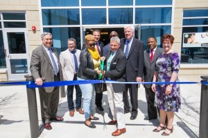 Officials Cut Ribbon to Mark Opening of Linc at Orange Station.  